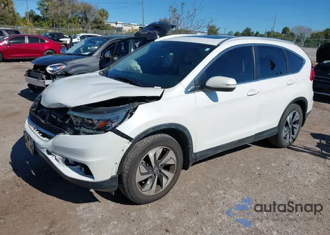 2016 Honda Cr-V Touring z USA, uszkodzony, nr VIN 5J6RM3H92GL018129
